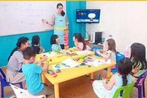 KidAble classroom with children learning English and Chinese. Montessori Method for Child Development at KidAble.